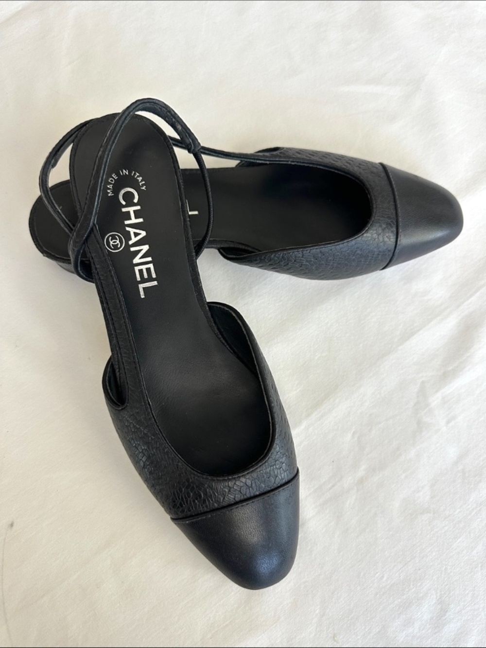 CHANEL -  Black Leather Slingback Capped Toe Flats with Logo Heel